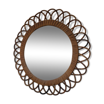 Vintage mirror in rattan flowers, sun