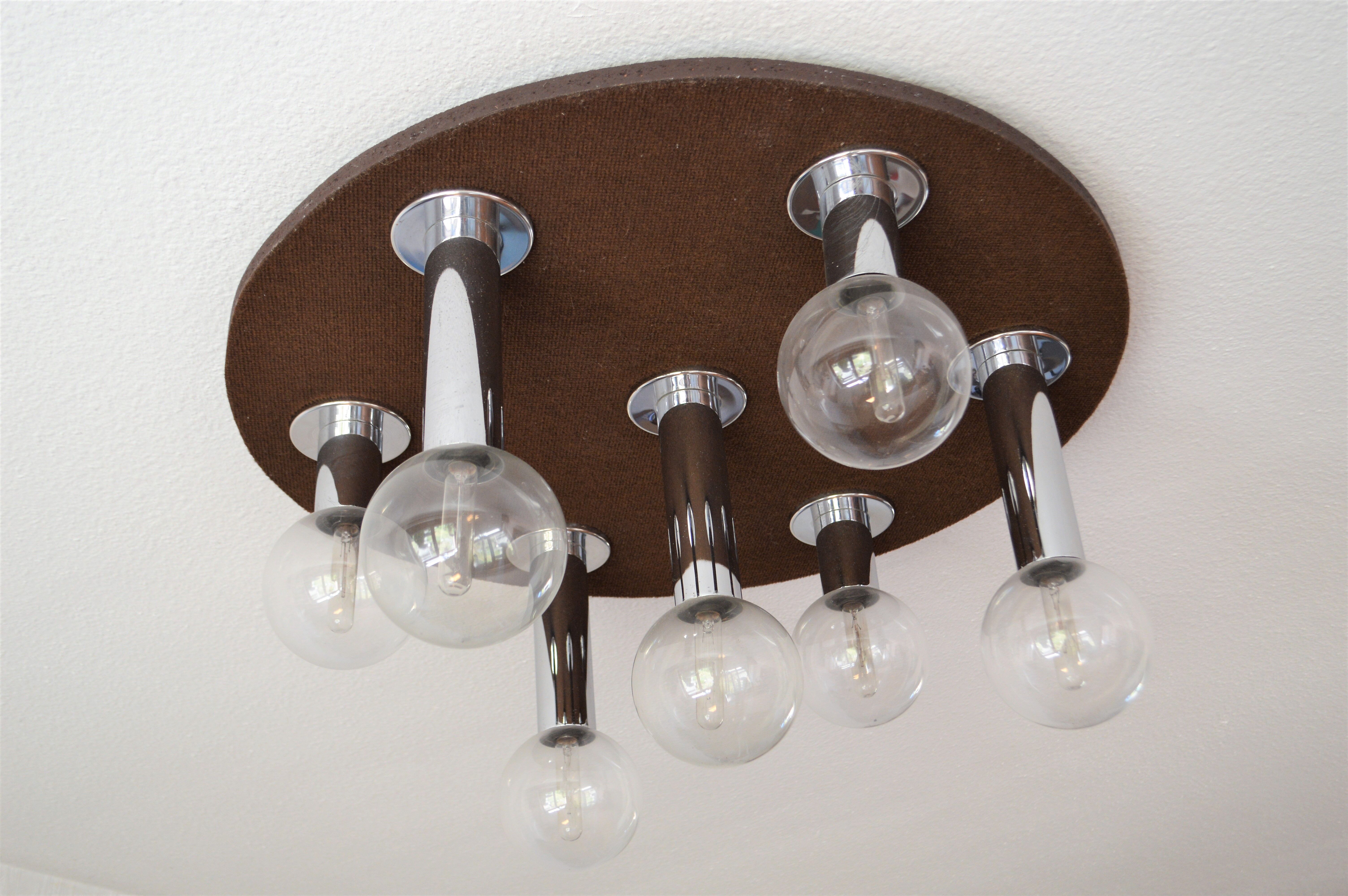 Vintage lamp of the 70s design in chrome glass space age