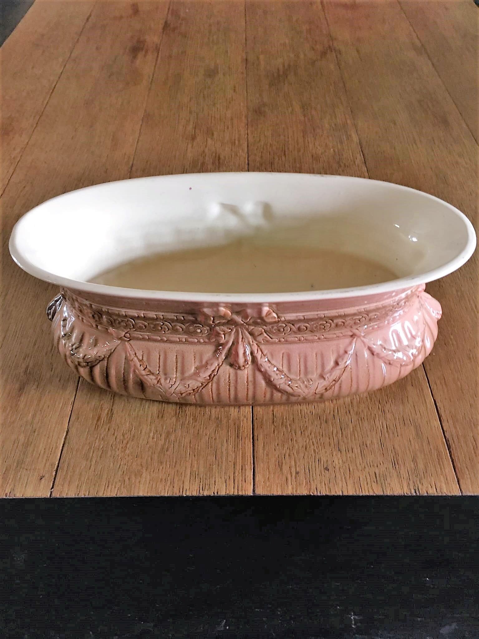 Planter in earthenware stamped de bruyn in pink tones