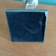 Silver-plated metal candlestick and lucite plexiglass