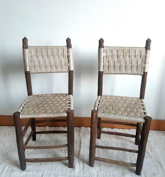 Brutalist wooden and rope chairs