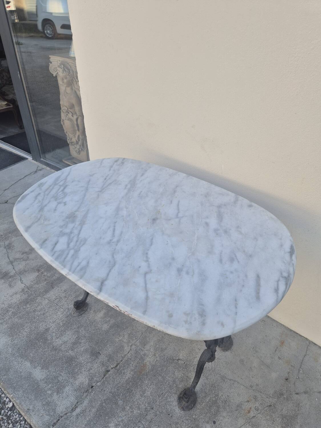 Antique cast iron and marble bistro restaurant table