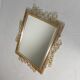 Vintage faceted mirror in an aluminium frame