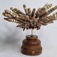 Antique sea urchin pencil on turned wooden base, 22 cm