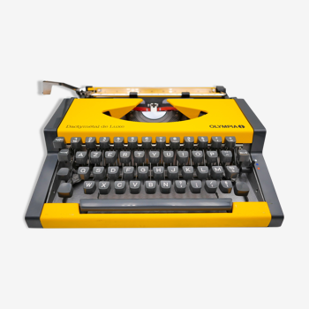 Machine à écrire Olympia Dactymétal De Luxe Jaune révisée ruban neuf