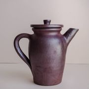 Brown ceramic artisan coffee maker
