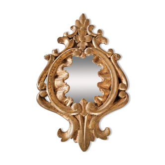 Miroir ancien en bois doré en forme de fleurs