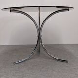 Chrome metal and smoked glass round table, Italy circa 1970.