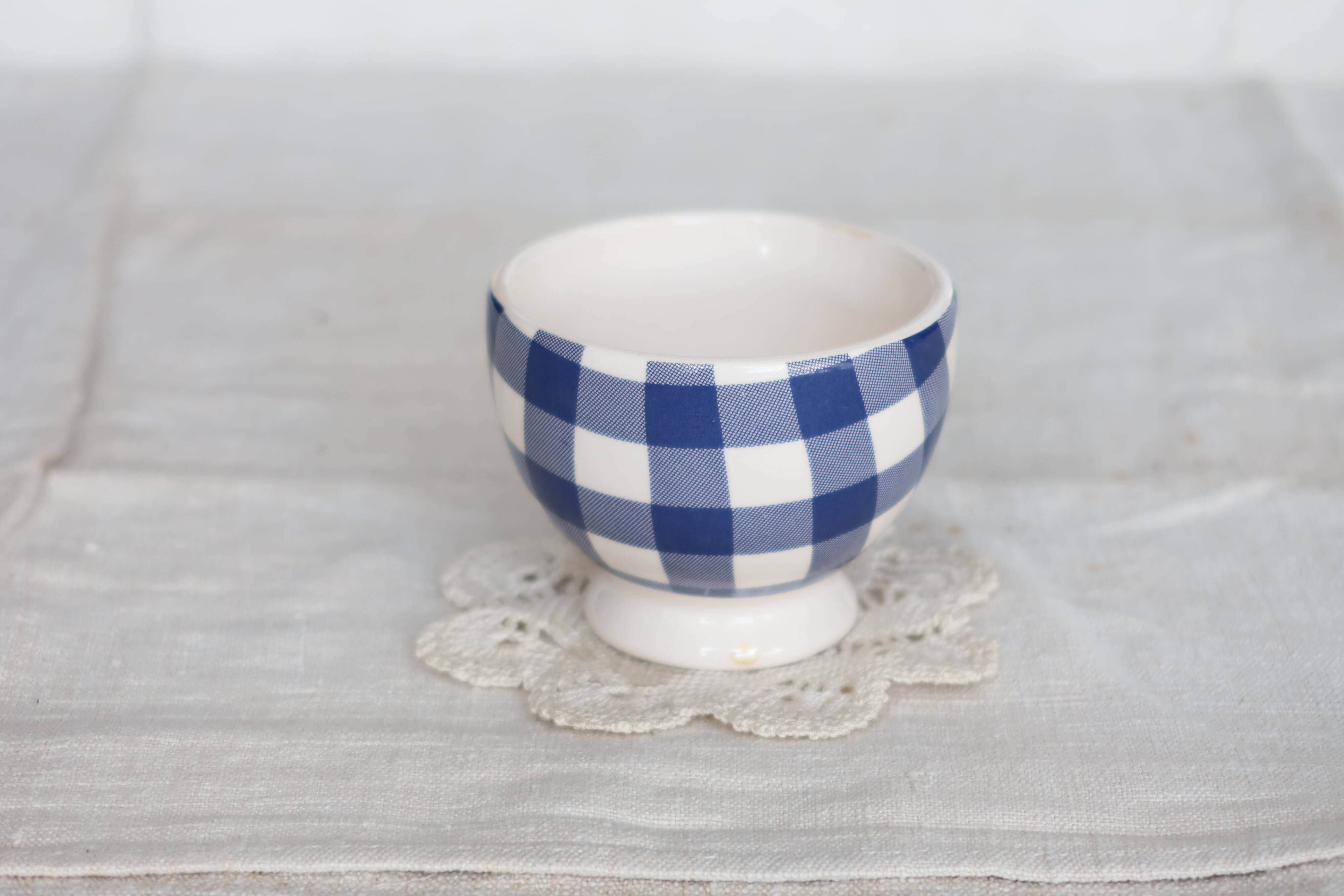 Small vintage white earthenware bowl with blue gingham pattern