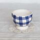 Small vintage white earthenware bowl with blue gingham pattern