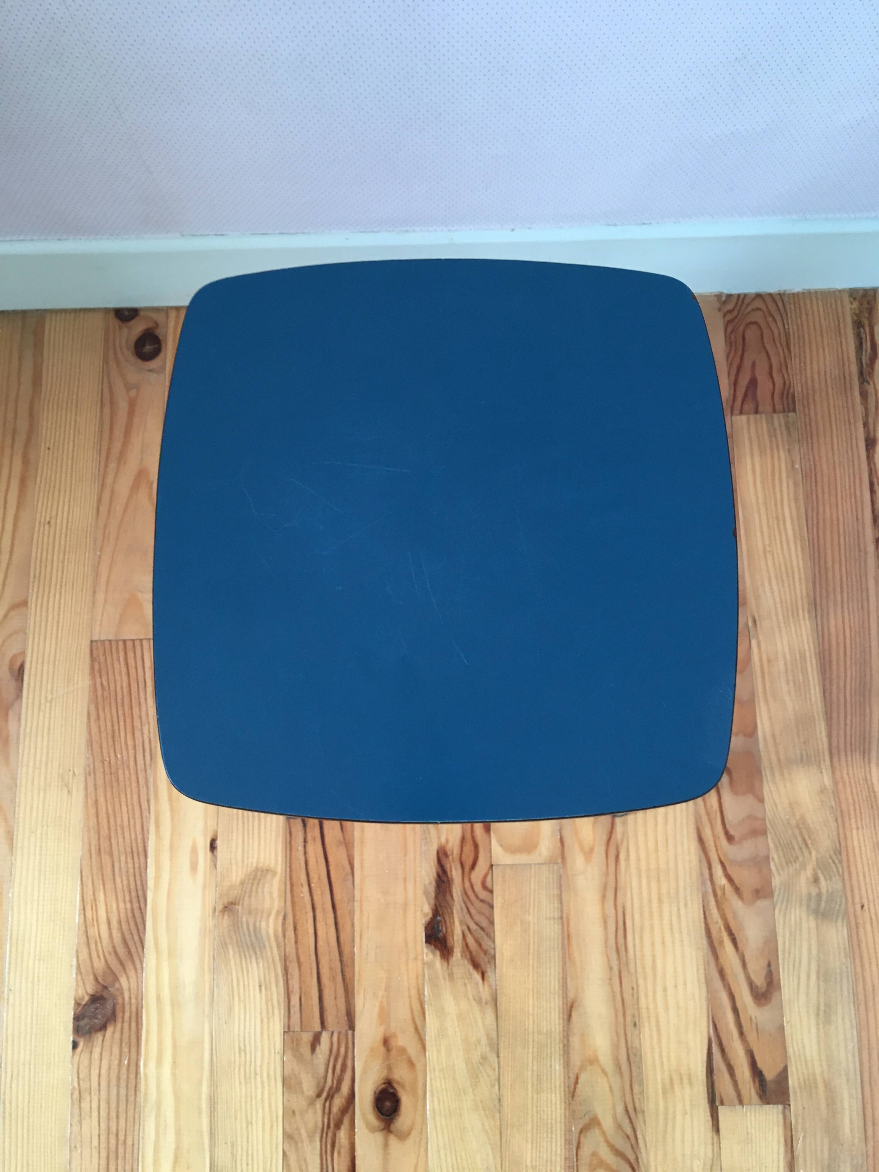 Hard blue formica stool
