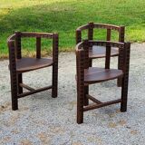 Set of three brutalist tripod armchairs in carved solid oak