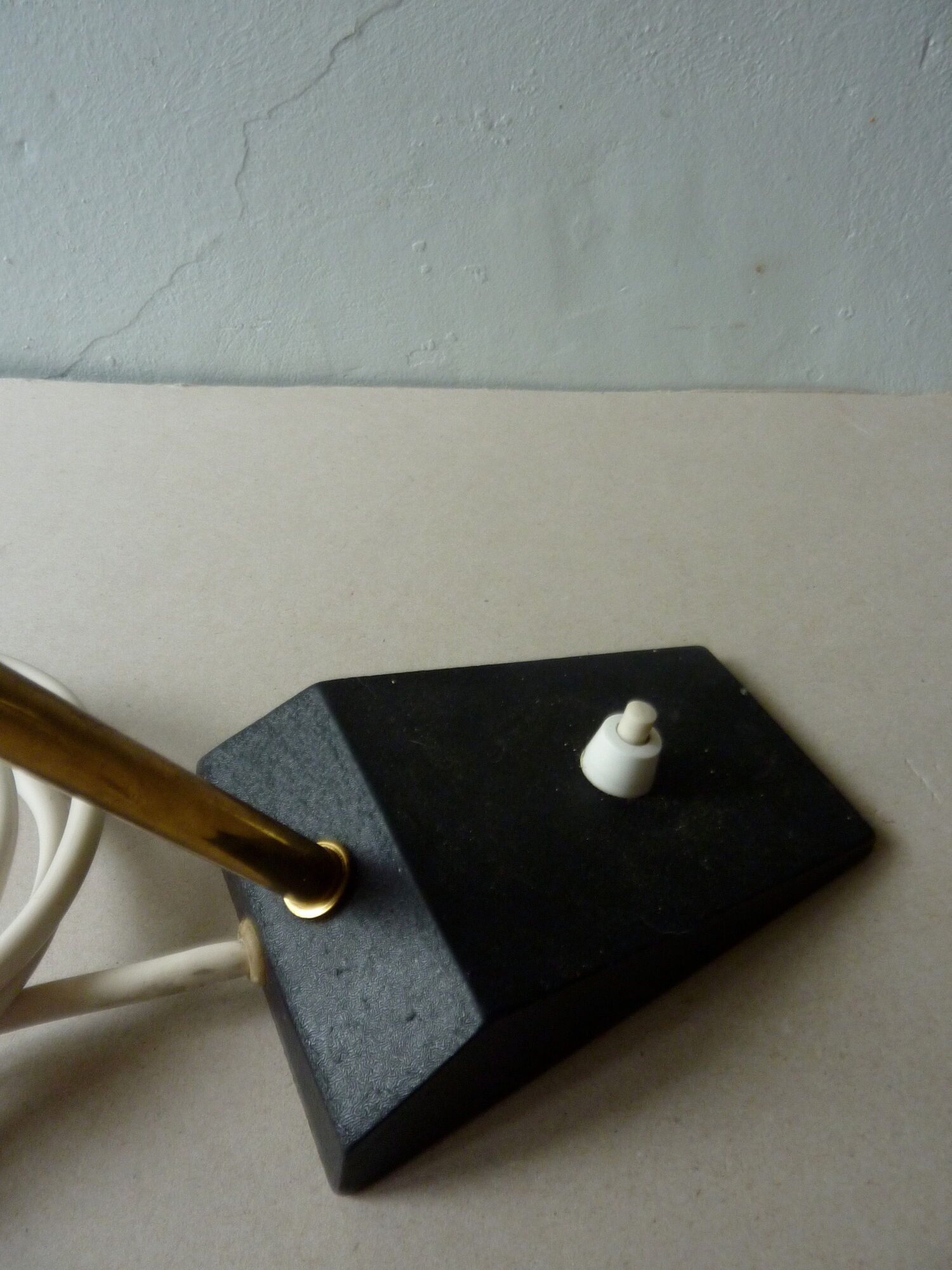 Lamp with ball black metal and brass of the 1950s