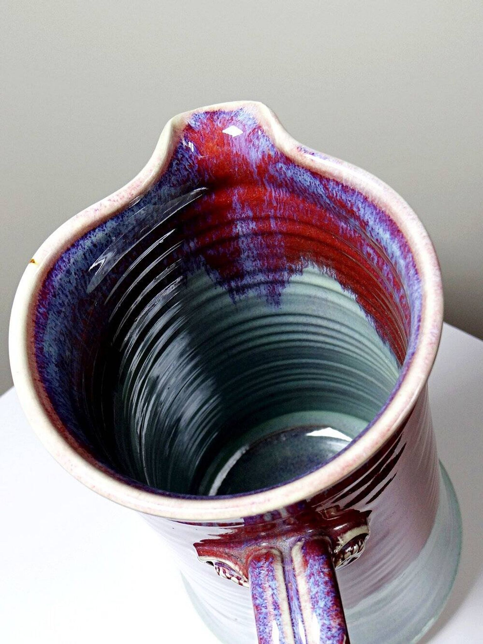 Large artistic stoneware vase by Lévéjac Michel Goldstyn, with flamed oxblood glaze.