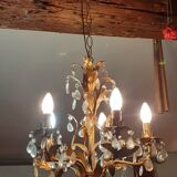 Very pretty chandelier with tassels and leaves in gold sheet metal.