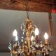 Very pretty chandelier with tassels and leaves in gold sheet metal.