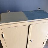 Weathered toilet cabinet