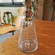 Old glass and silver metal carafe