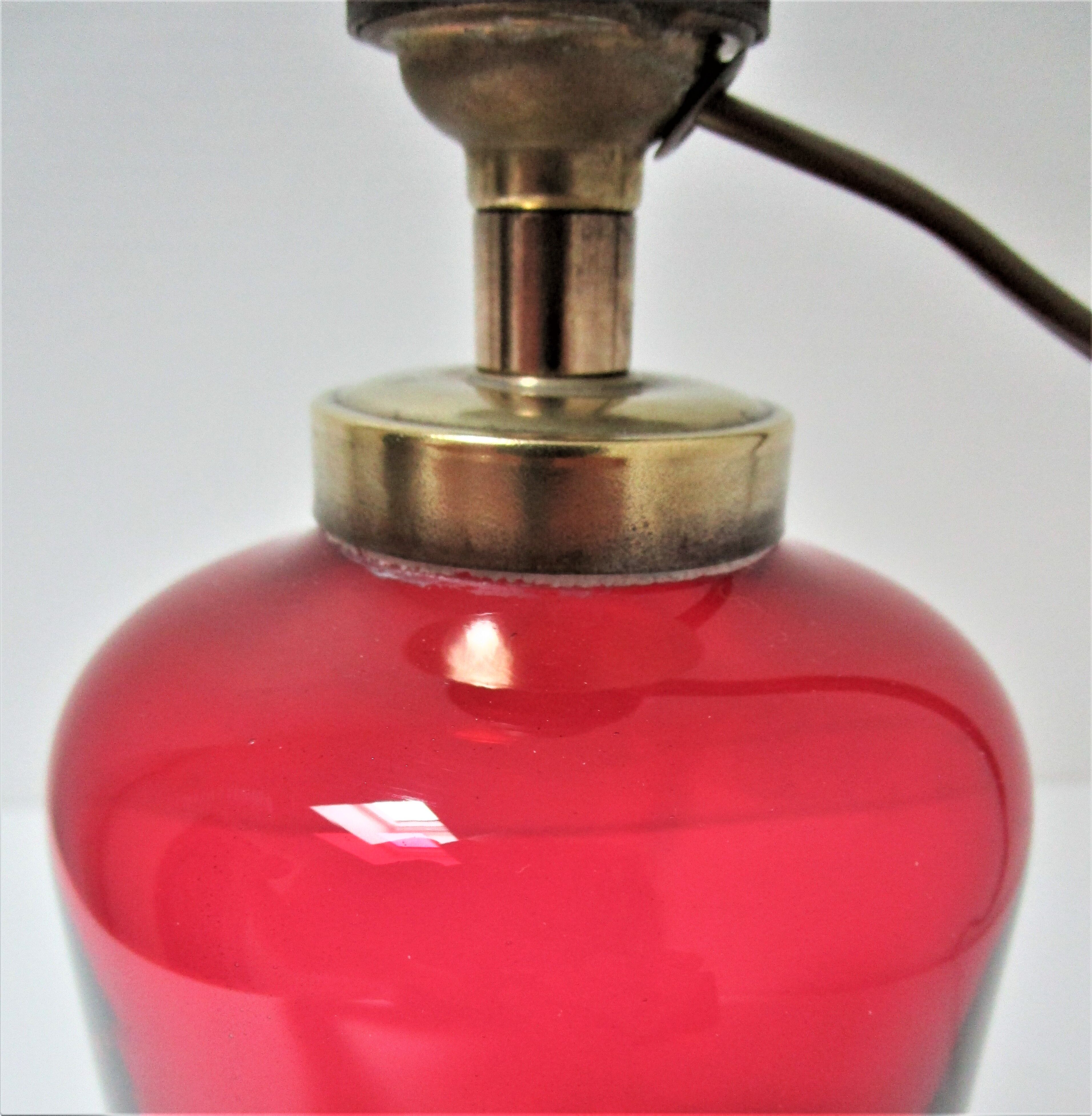 Red glass lamp and vintage brass