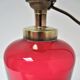 Red glass lamp and vintage brass