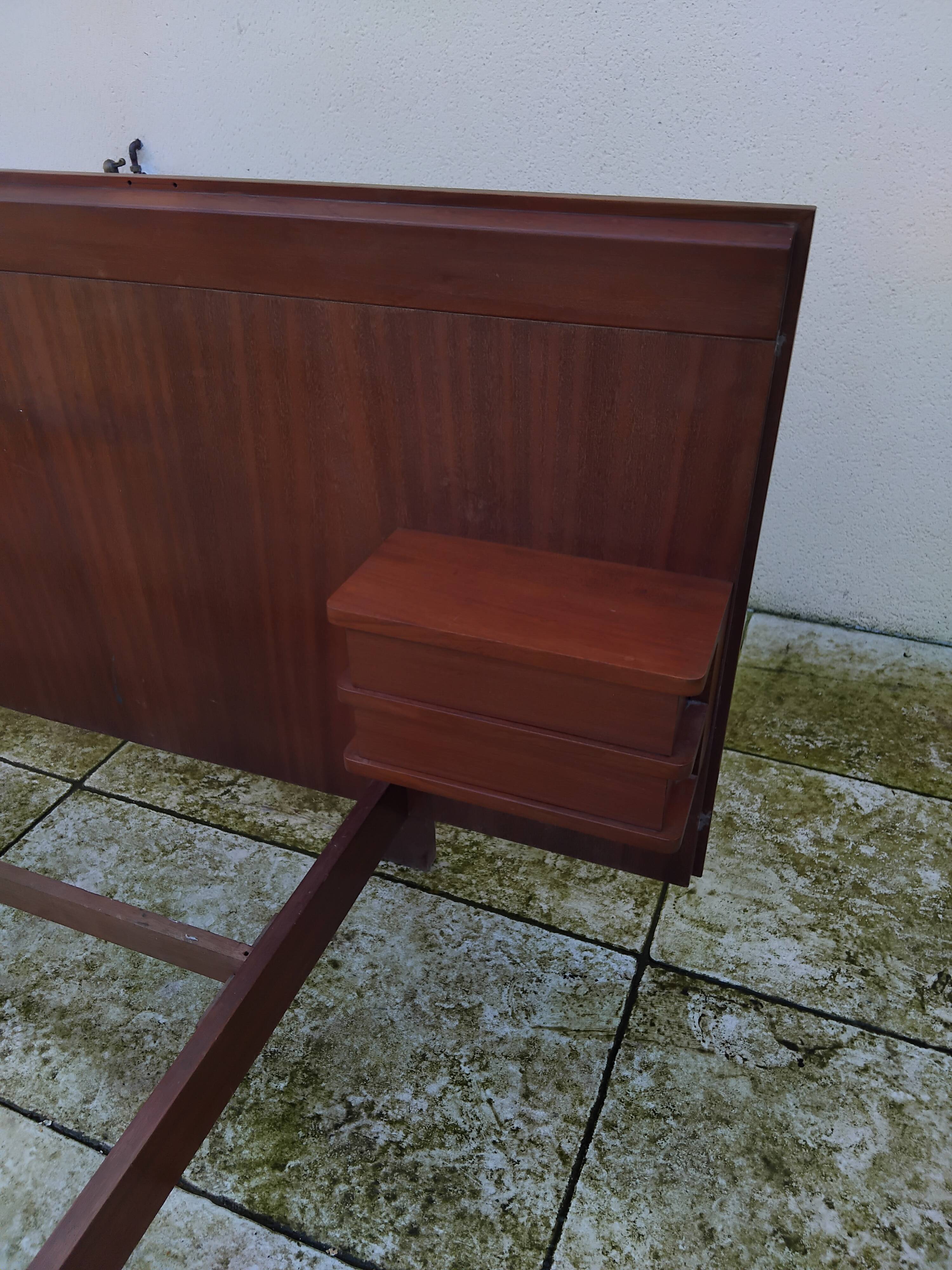 Vintage Scandinavian teak adult bed from the 60s and 70s bedside table.