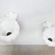 Pair of art deco porcelain and glass wall appliques