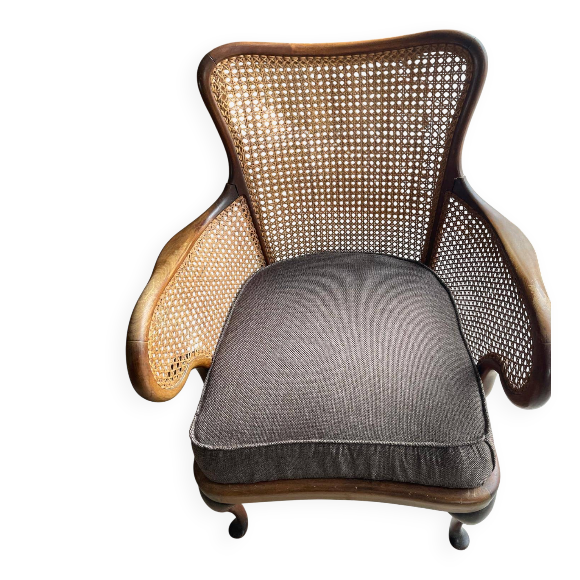 Chair with cane back and recently reupholstered fabric seat.