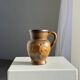 Speckled stoneware jug with grape pattern H17