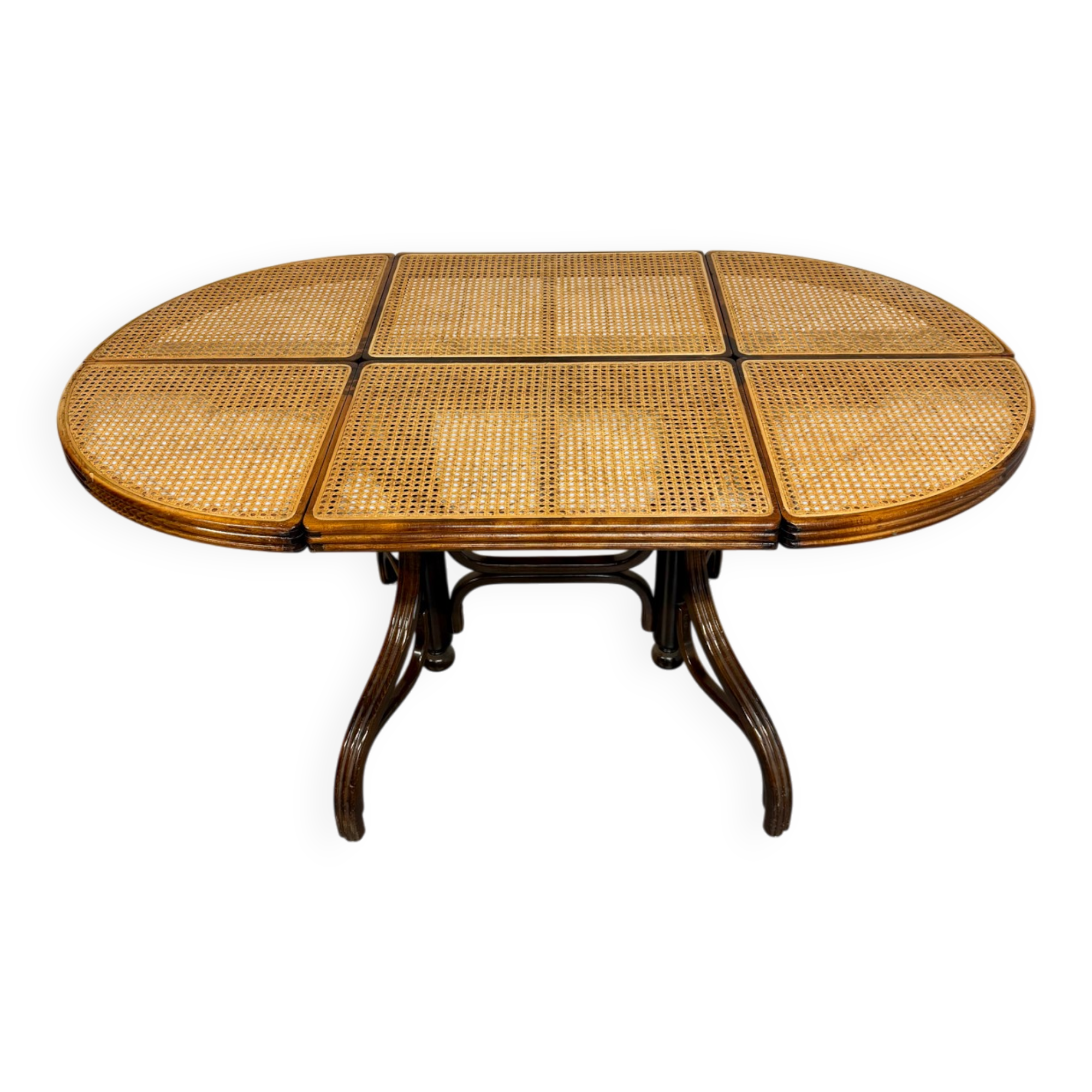 Vintage dining table with a cane top by Mundus from the 1970s.