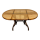 Vintage dining table with a cane top by Mundus from the 1970s.