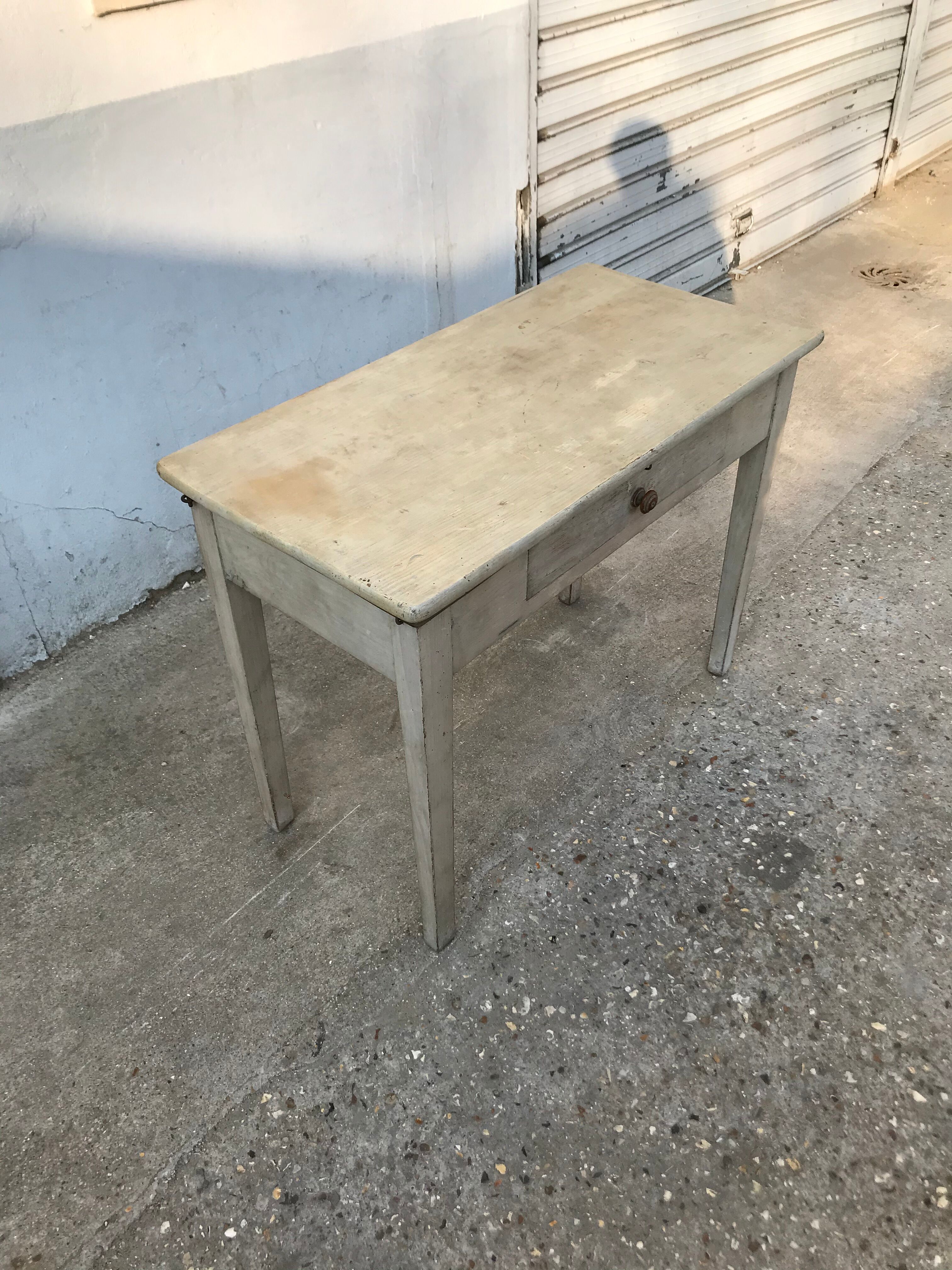 Pale green patinated wooden desk