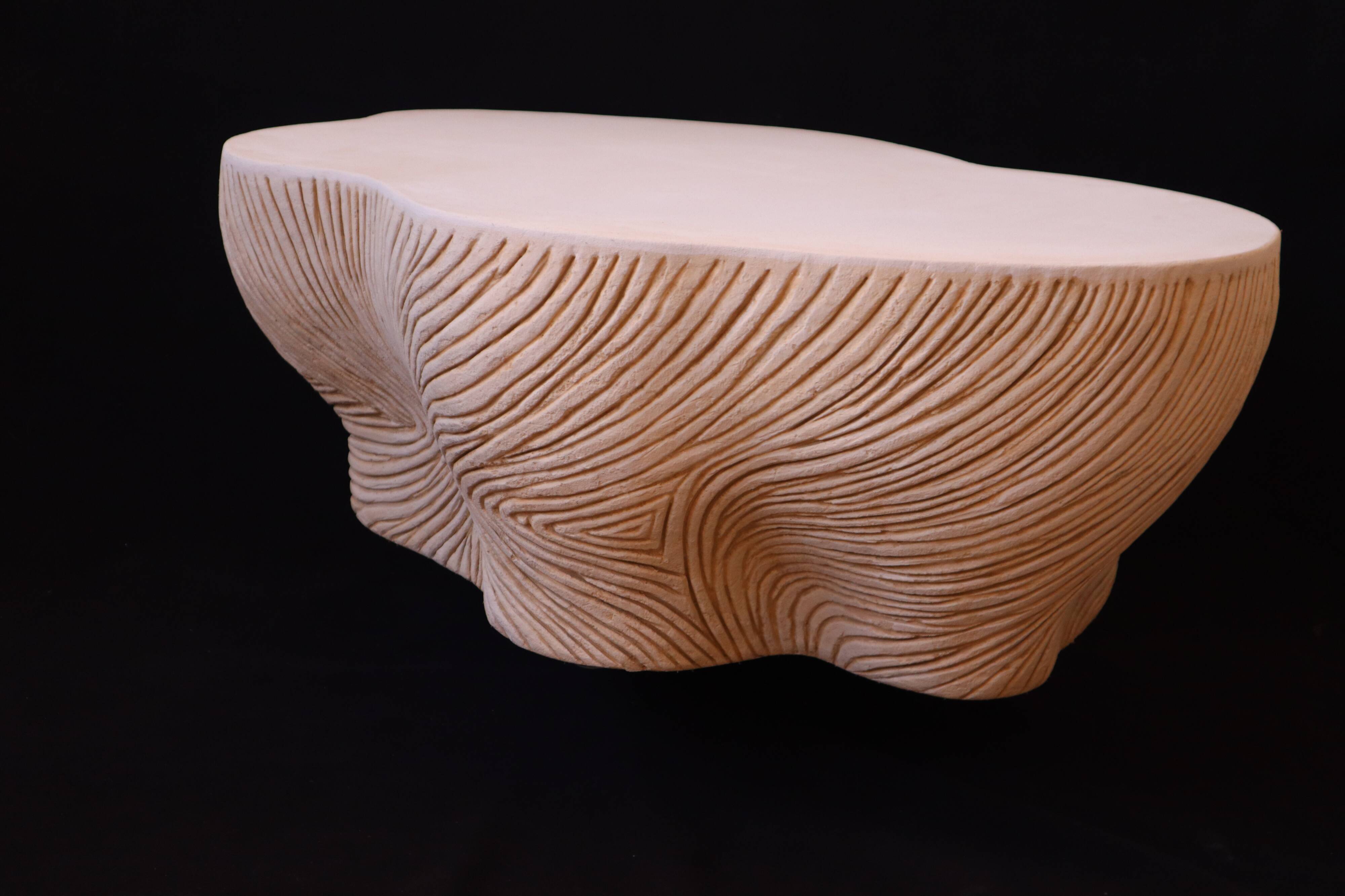 Design coffee table with travertine rock effect — unique piece hand-sculpted.