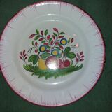 Round dish in earthenware from the east