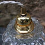 Moulded glass globe hand lamp