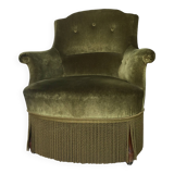 Olive green toad armchair with smooth velvet fringes.
