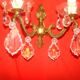 pair of bronze and crystal wall lights with 2 arms