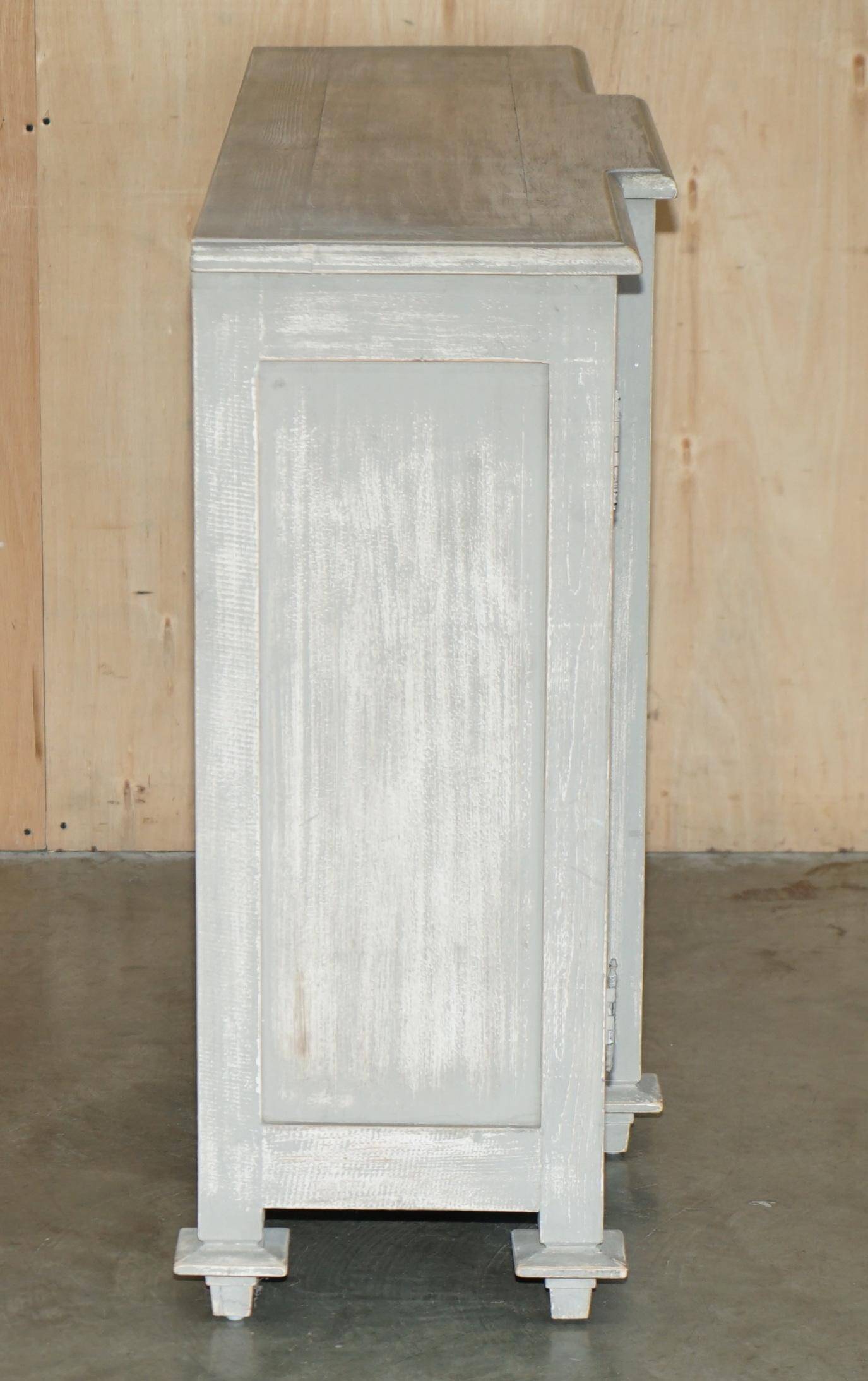 Vintage sideboard with wrought iron doors