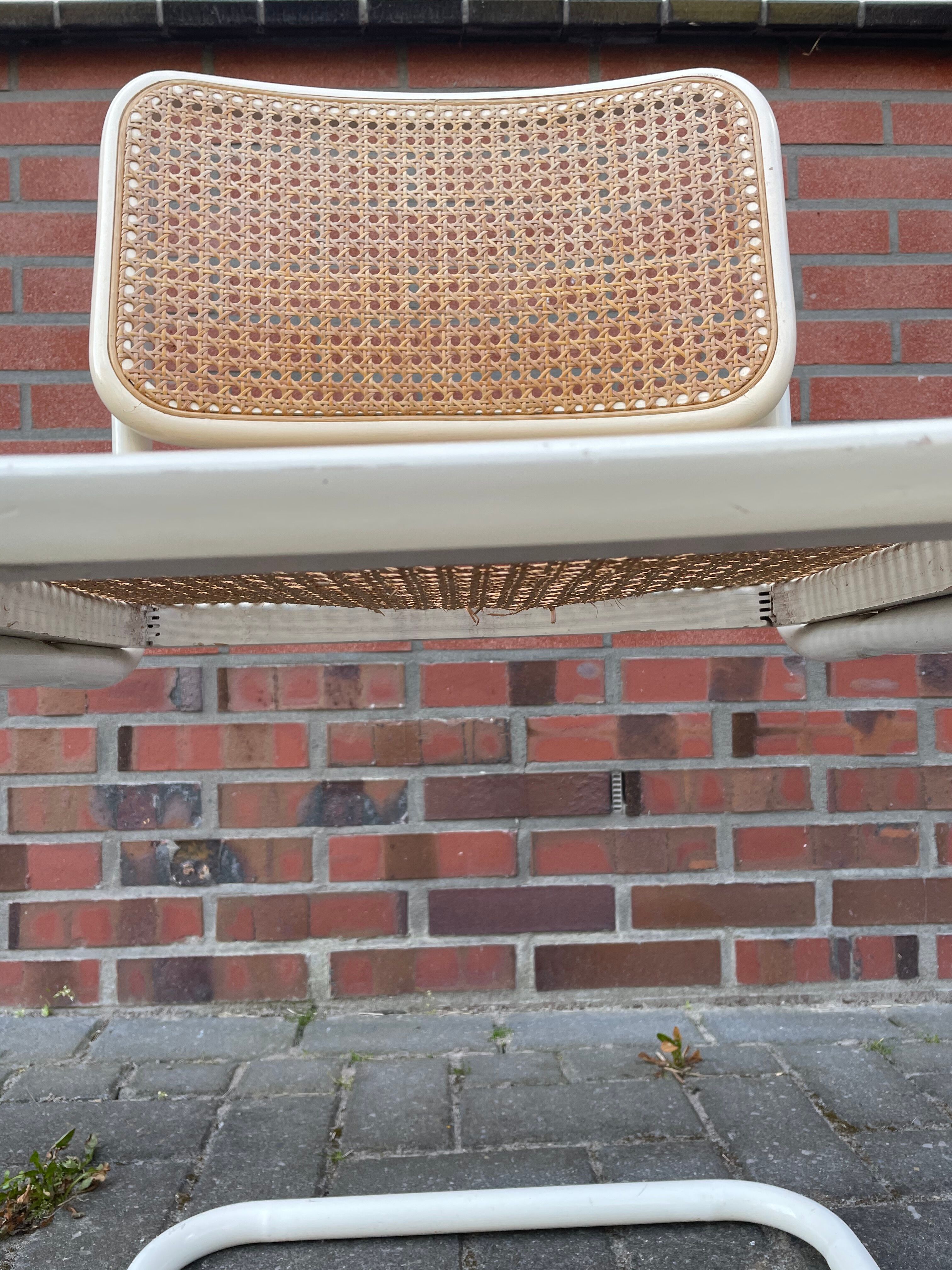 Cesca dining room chair designed by Marcel Breuer