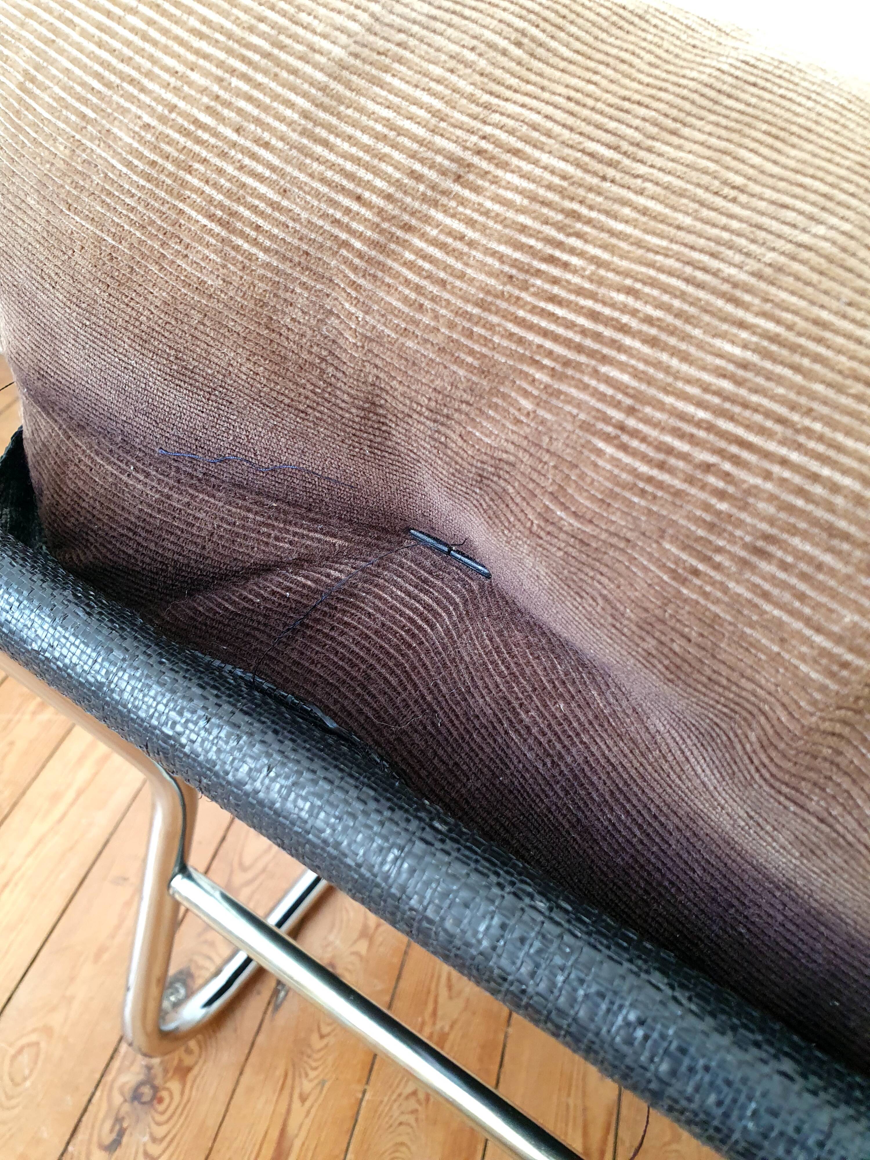 Vintage tubular chrome and velvet armchair