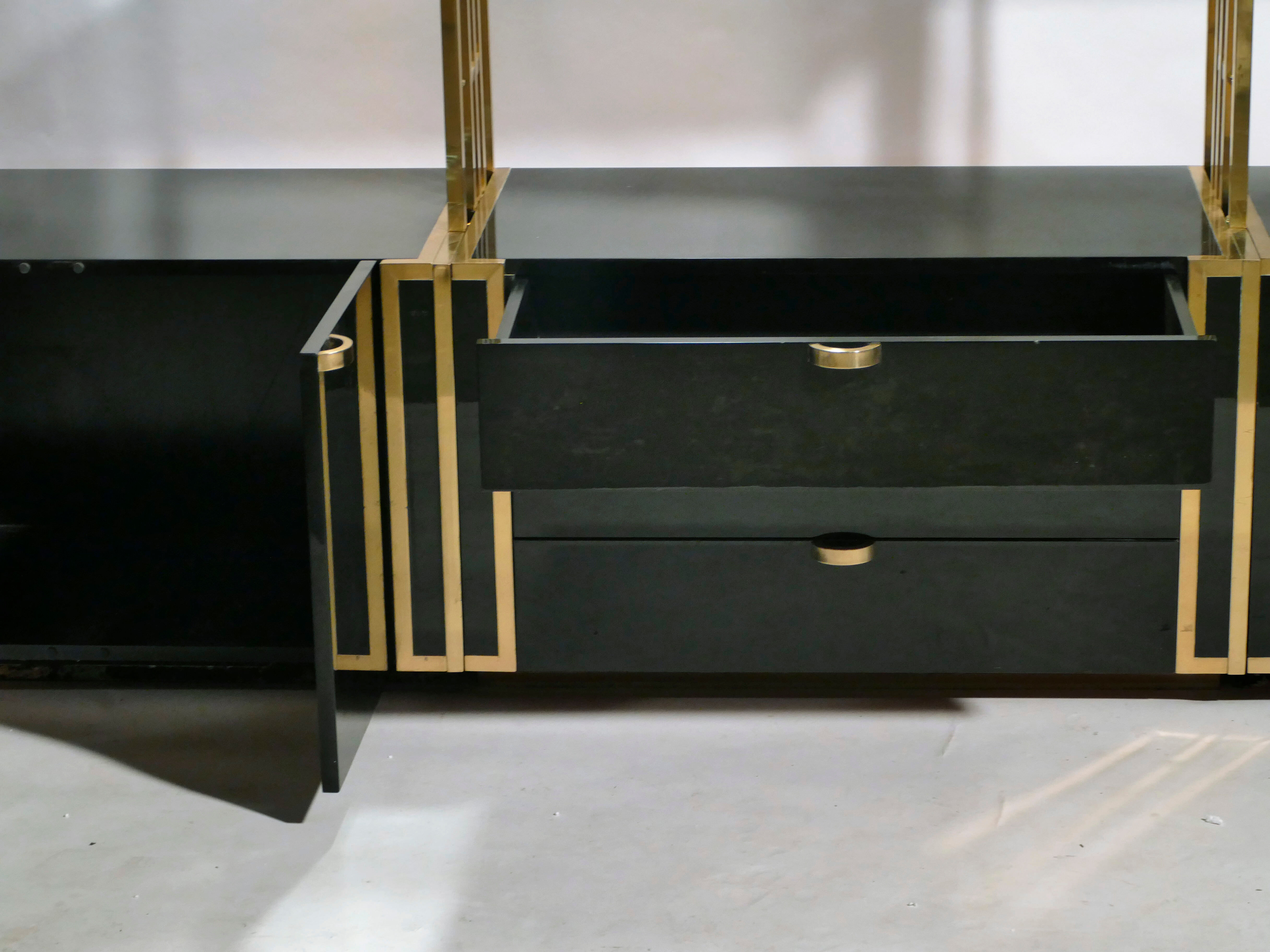 Brass laced library shelf by Kim Moltzer 1970