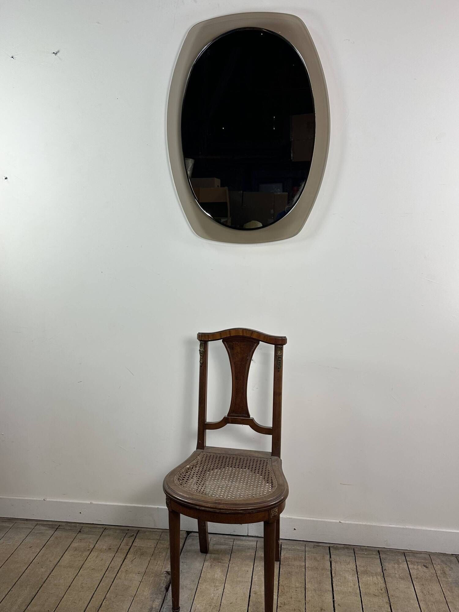 Vintage mirror with smoked glass frame from the 1970s.