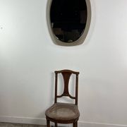 Vintage mirror with smoked glass frame from the 1970s.