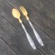 Silver and ivory salad cutlery in early 20th century