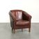 Sheepskin club armchair in English style with brown colour scheme