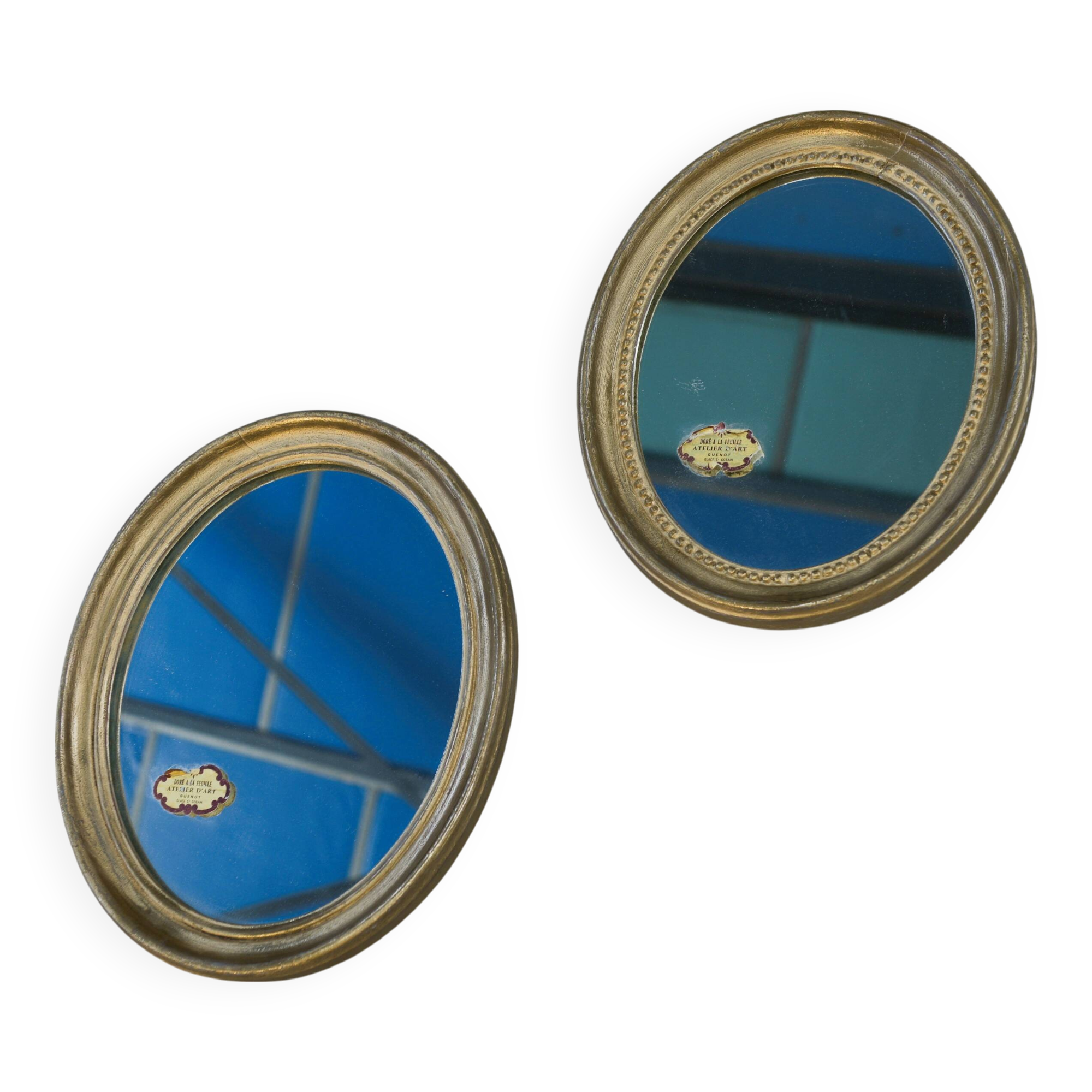 Paire de miroirs ovales, 1950