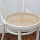 White wooden chair with cannage
