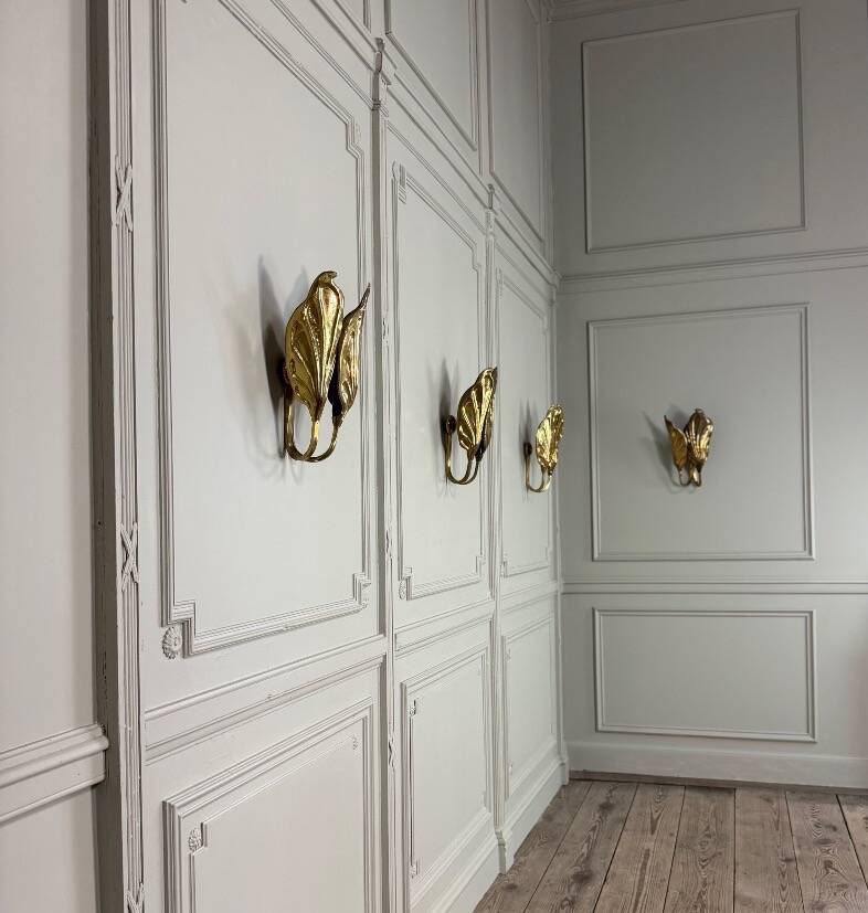 Set of four gilt brass wall lights, Tommaso Barbi, circa 1960.