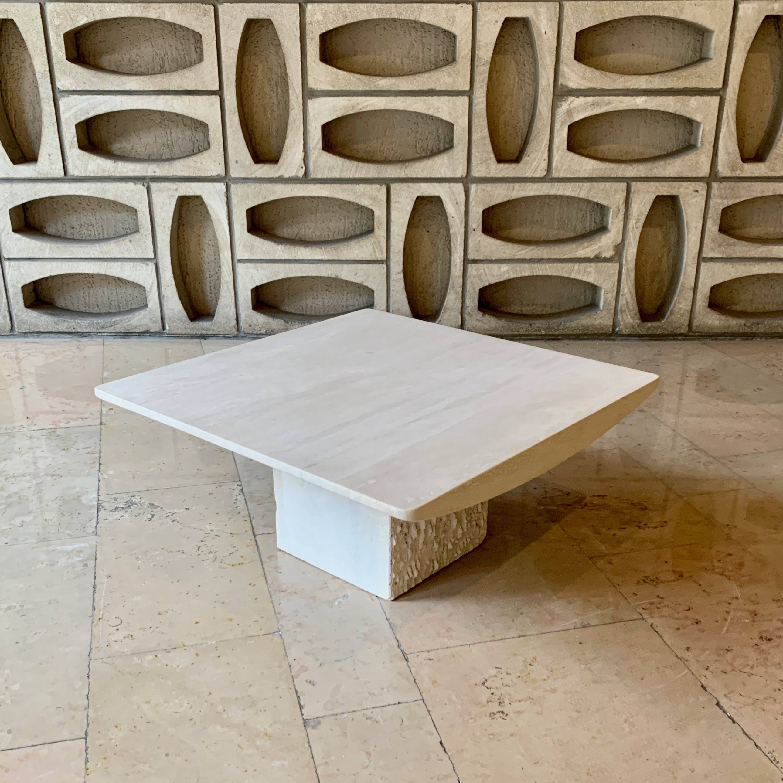 Square coffee table in honed travertine by Claude Berraldacci