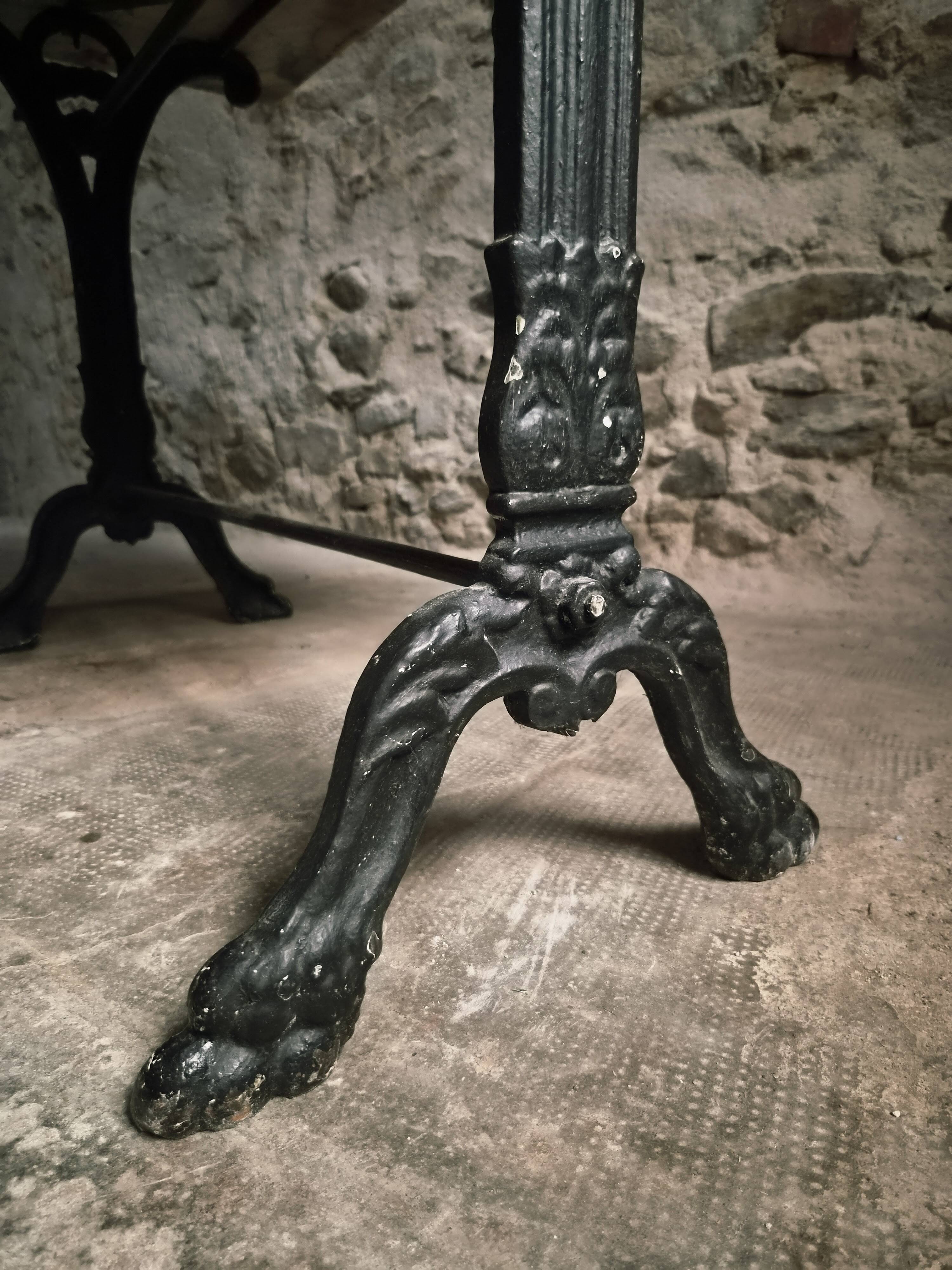 French bistro table made of marble with a cast iron base, 1920s–1930s.