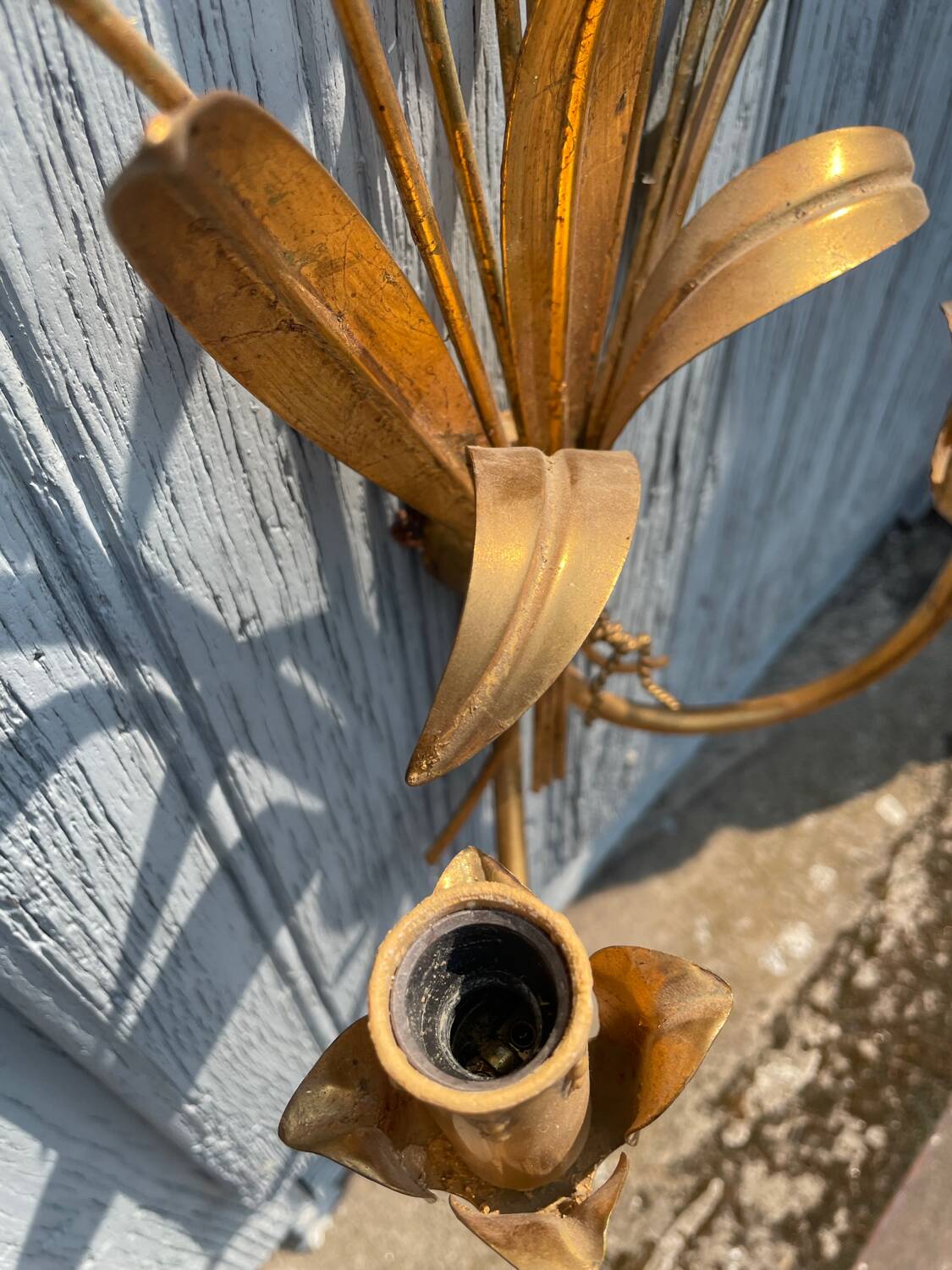 Pair of wall sconces in the shape of a wheat sheaf with two lights.